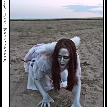 Dark Angel - Monica This was a test shoot we quickly put together. The strange thing was, we where in the middle of no-where, in an un-used field and we where thrown